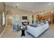 Open concept living area with neutral paint, tile floors, and natural light at 607 Vintage Way, Brandon, FL 33511