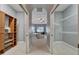 Spacious walk-in closet featuring open door to the main bedroom at 607 Vintage Way, Brandon, FL 33511