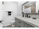 Stylish bathroom features a modern vanity, framed mirror, and sleek black hardware at 716 Lyndhurst St # 702, Dunedin, FL 34698
