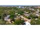 Aerial view of a neighborhood with a single-story home with solar panels at 809 Scotland St, Dunedin, FL 34698