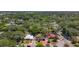 Aerial view of a neighborhood featuring a cozy single-story home with solar panels at 809 Scotland St, Dunedin, FL 34698