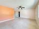 Open floorplan living room with view to hall and doorways at 809 Scotland St, Dunedin, FL 34698
