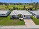 An aerial view of this charming home with a paver driveway and beautiful tile roof at 10036 40Th N St # 3, Pinellas Park, FL 33782