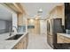 Bright kitchen featuring stainless steel appliances, light wood cabinets and granite countertops at 10036 40Th N St # 3, Pinellas Park, FL 33782