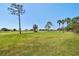The lovely expansive lawn is the perfect place to practice your putt at 10036 40Th N St # 3, Pinellas Park, FL 33782