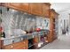 Chef's kitchen features professional-grade stainless steel appliances, range hood, and ample counter space at 147 & 139 Edgewater Dr, Dunedin, FL 34698
