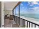 Relaxing balcony offers beautiful views of the beach, ocean, and the sky at 15462 Gulf Blvd # 504, Madeira Beach, FL 33708