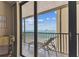 The balcony features stunning ocean views and comfortable lounge chairs at 15462 Gulf Blvd # 504, Madeira Beach, FL 33708