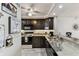 Well-equipped kitchen with modern appliances, granite countertops, and ample cabinet space at 15462 Gulf Blvd # 504, Madeira Beach, FL 33708