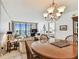 Spacious living room featuring a view of the ocean, with adjacent access to bedrooms at 15462 Gulf Blvd # 504, Madeira Beach, FL 33708