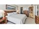 A bright and airy main bedroom with closet, and an ensuite bathroom at 15462 Gulf Blvd # 504, Madeira Beach, FL 33708