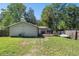 Expansive backyard featuring a deck and lush green grass perfect for outdoor activities and relaxation at 186 Grand Ave, Brooksville, FL 34604