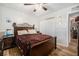 Bedroom showcasing wooden bed frame, wood-look flooring, and a closet for ample storage at 186 Grand Ave, Brooksville, FL 34604