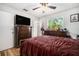 Bedroom with wooden flooring, window view, and ample space at 186 Grand Ave, Brooksville, FL 34604