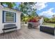 A view of the backyard deck and landscaping in the backyard at 1905 Mckinley St, Clearwater, FL 33765