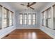 Bright room showcasing hardwood floors, natural light, and classic trim, creating a comfortable and inviting space at 1905 Mckinley St, Clearwater, FL 33765