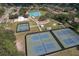 Aerial view of community park with tennis courts, pickleball courts, basketball court and playground at 2113 Golf Manor Blvd, Valrico, FL 33596