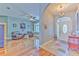 The foyer is adjacent to a living area, offering an open and connected layout at 2113 Golf Manor Blvd, Valrico, FL 33596