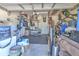 View of garage currently purposed as a gym with workout equipment, weights and more at 2113 Golf Manor Blvd, Valrico, FL 33596