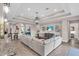 Spacious living room with recessed lighting, a tray ceiling, and tile floors at 2165 Hollow Forest Ct, Wesley Chapel, FL 33543