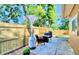 Relaxing patio with a wooden fence, comfortable seating, and a pleasant outdoor space at 2501 Crescent Dr, Largo, FL 33770