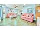 Spacious living room with stylish decor, plush seating, and an open layout at 2501 Crescent Dr, Largo, FL 33770