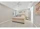 Bedroom with vaulted ceiling, neutral walls, large bed, and bright natural light at 2511 Early Dawn Ct, Valrico, FL 33594