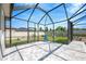 Backyard pool area featuring a screened-in enclosure and brick paved patio and a fenced in yard at 2511 Early Dawn Ct, Valrico, FL 33594