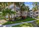 This condo has a charming exterior surrounded by gorgeous palm trees at 2650 Countryside Blvd # C203, Clearwater, FL 33761