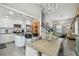 The interior showcasing the kitchen, dining room and staircase at 2704 W Main St, Tampa, FL 33607