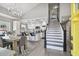 Bright interior showcasing an open-concept living space with modern finishes and a staircase at 2704 W Main St, Tampa, FL 33607