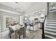 The home features a spacious dining area with a kitchen and staircase at 2704 W Main St, Tampa, FL 33607