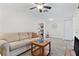 Comfortable living room featuring tile floors and a neutral color palette at 2909 60Th N Ave, St Petersburg, FL 33714