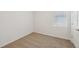 Small carpeted bedroom with a window at 3590 Moscato Dr, Brooksville, FL 34602