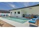 Backyard with a large pool and patio dining; a great place to entertain at 4021 Ohio Ave, Tampa, FL 33616