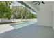 Inviting backyard with a pool, patio area, and fresh landscaping at 4021 Ohio Ave, Tampa, FL 33616