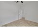 Spacious bedroom with light wood floors and neutral walls, offering a clean and modern aesthetic at 4021 Ohio Ave, Tampa, FL 33616