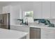 Bright kitchen with stainless steel appliances, stylish countertops, and ample storage space at 4021 Ohio Ave, Tampa, FL 33616