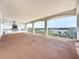 Spacious balcony with an outdoor kitchen and waterfront views at 404 Hillsborough St, Palm Harbor, FL 34683