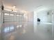 Spacious three car garage with epoxy floors and ample room for storage at 404 Hillsborough St, Palm Harbor, FL 34683