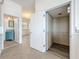 Hallway showing a view of the elevator, half bath and dining room at 404 Hillsborough St, Palm Harbor, FL 34683