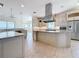 Well-equipped kitchen with a large island, modern appliances, and ample counter space, ideal for cooking at 404 Hillsborough St, Palm Harbor, FL 34683