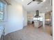 Spacious kitchen with stainless steel appliances, tile floors and an island cooktop at 404 Hillsborough St, Palm Harbor, FL 34683