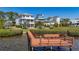 Stunning waterfront home featuring a private dock, lush landscaping, and architectural design at 404 Hillsborough St, Palm Harbor, FL 34683