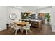 Modern kitchen with wood cabinets, stainless steel appliances, and a spacious island at 409 E Oak Ave # 9, Tampa, FL 33602