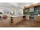 Modern kitchen with wood cabinets, stainless steel appliances, and a spacious island at 409 E Oak Ave # 9, Tampa, FL 33602