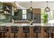 Stylish kitchen with a large island, modern lighting, and a sleek design, perfect for culinary enthusiasts at 409 E Oak Ave # 9, Tampa, FL 33602