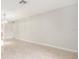 Bright living room with neutral walls, tiled floors, and an open floor plan at 4120 Marine Pkwy, New Port Richey, FL 34652