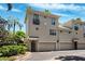 Charming multi-story townhome with attached garages and a well-manicured landscape at 501 Knights Run Ave # 5101, Tampa, FL 33602