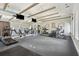 Community gym with a variety of exercise equipment, mirrors, and televisions for residents to enjoy at 501 Knights Run Ave # 5101, Tampa, FL 33602